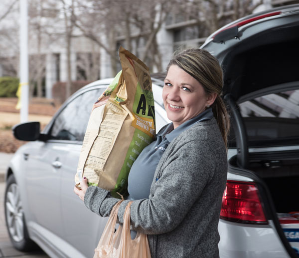 Concierge delivering groceries