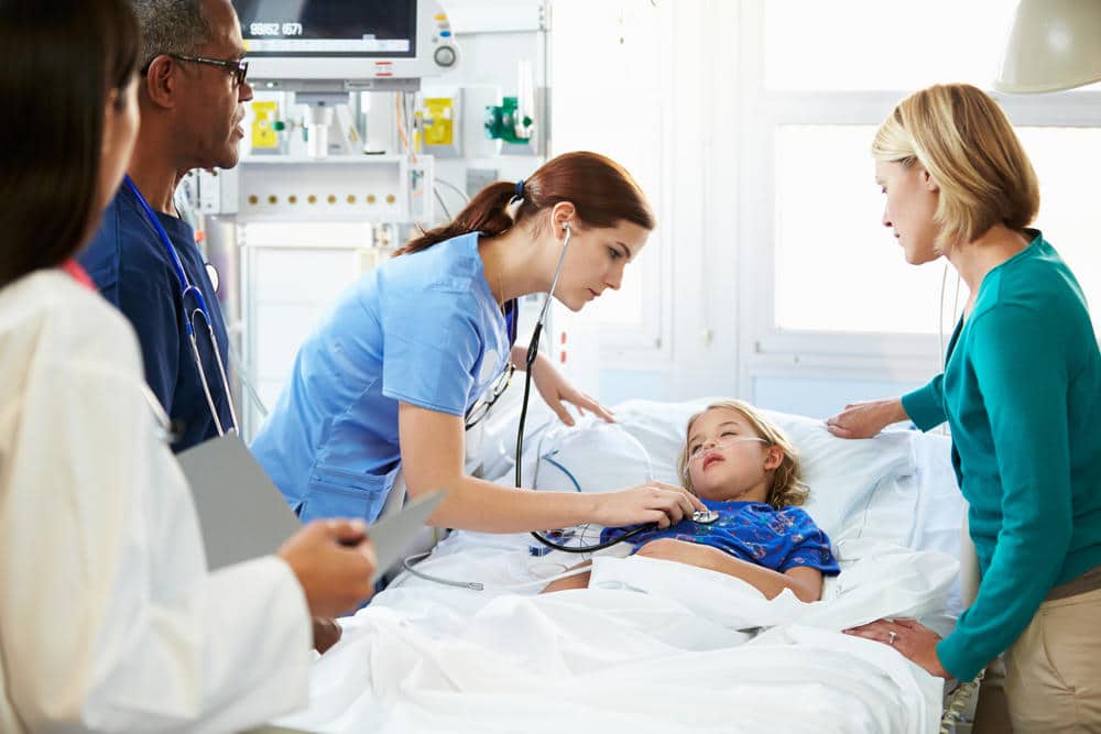 Worried parent with her daughter at the hospital