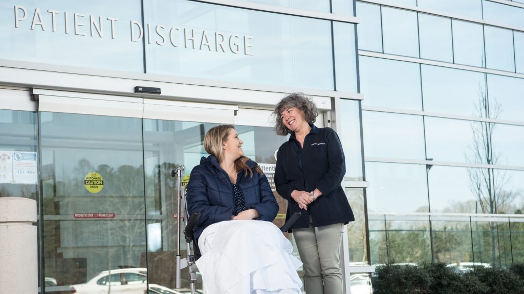 Hospital Concierge helping a patient's discharge.