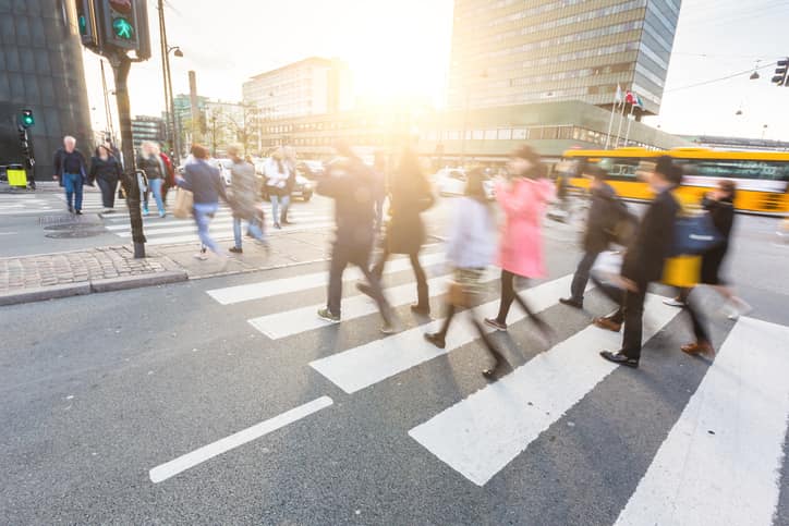 Employees commuting to work in the busy city center.